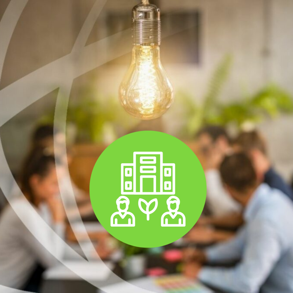 Des personnes travaillant dans un espace coworking avec une illustration d'ampoule symbolisant l'engagement écologique